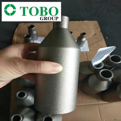อุปกรณ์ท่อเหล็กโลหะผสมไทเทเนียม ASTM B363 Ti Gr7 2 '' x 1 '' SCH10S x SCH40S จุกนมยางโลหะผสมไทเทเนียม