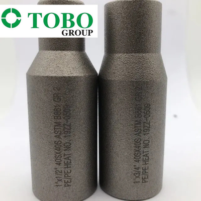 ฟิตติ้งท่อฟอร์จเหล็กโลหะผสมไทเทเนียม ASTM B861 GR2 2 '' x 1 '' SCH10S x SCH40S จุกนมยางโลหะผสมไทเทเนียม
